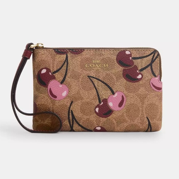 Coach Handbags - Coach Corner Zip Wristlet In Signature Canvas With Cherry Print